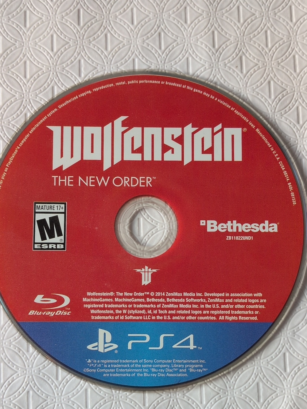 Wolfenstein: The New Order PS4 Game Disc - Red (Bethesda)